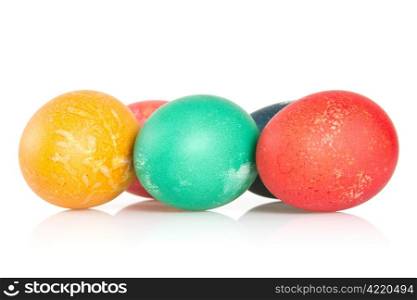 painted easter eggs with reflection on white background