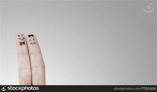 Painted finger smiley isolated on white