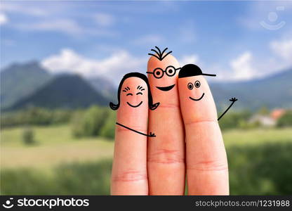 Painted fingers happy family concept making holidays in nature