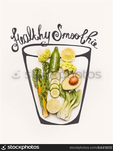 Painted glass with green smoothie drink ingredients: yellow chard or kale leaves , cucumber,avocado,broccoli and lemon , top view. Detox, dieting , clean eating or fitness food concept