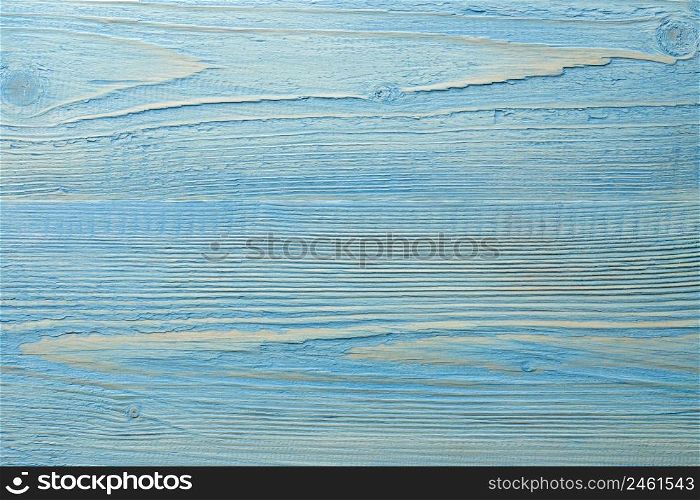 Painted light blue textured wooden backgound