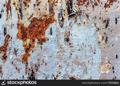 Painted metallic background with a large rusty spot and metal corrosion. Background, texture.