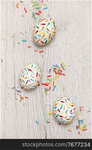 Painted Sprinkle Easter Eggs on white wooden table