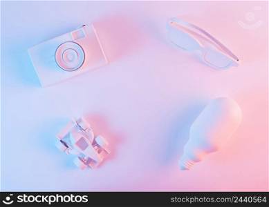 painted white camera eyeglass formula one car light bulb against pink background