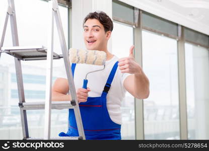 Painter repairman working at construction site