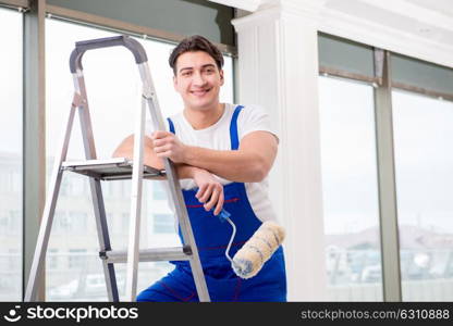 Painter repairman working at construction site