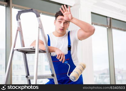 Painter repairman working at construction site