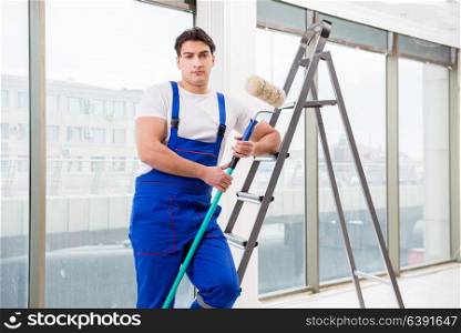 Painter repairman working at construction site