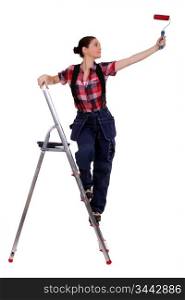 Painter standing on a stepladder