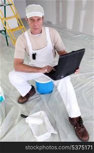 Painter with a laptop