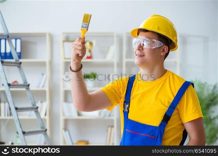 Painter working at home in refurbishment project