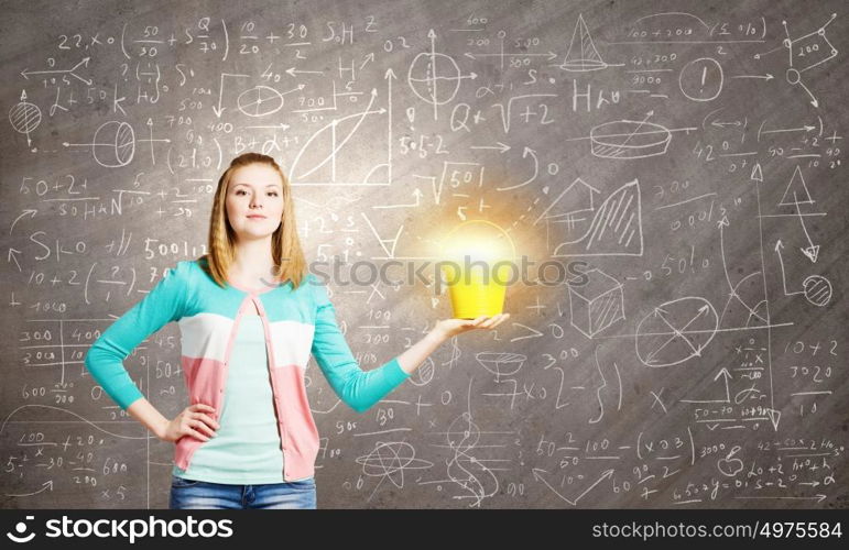 Painting concept. Young girl holding bucket with flying out fume