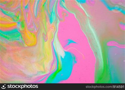 Painting in bright pastel colors using liquid fluid art trendy technique. Flat lay. Close-up. Concept contemporary art accessible to everyone. Horizontal.