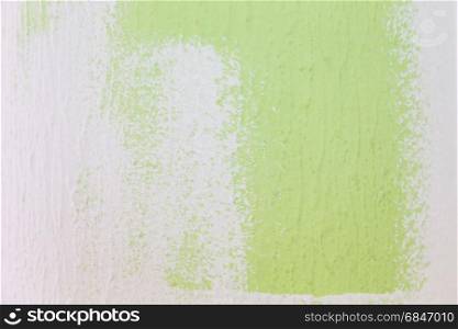 painting of a wall from green to white color