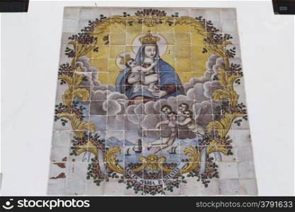 Paintings of the Blessed Virgin Mary on the facade of Church La Puritate the old town of Gallipoli (Le) in the southern of Italy