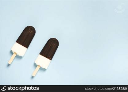 pair ice cream half chocolate sticks