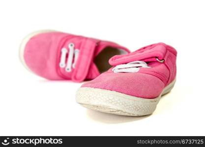 pair of baby shoes over a white background