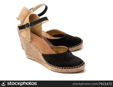 Pair of beige with black suede women&rsquo;s summer shoes. Isolate on white.