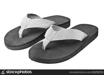 pair of black flip flops isolated on white background