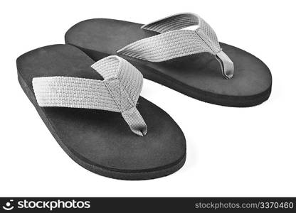 pair of black flip flops isolated on white background