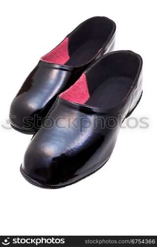 pair of black rubber galoshes isolated on white background