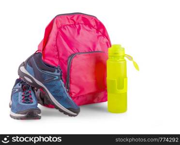 Pair of blue women's sneakers in pink backpack and sports bottle for a water on white