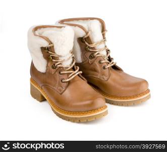 Pair of brown leather female boots isolated on whitePair of brown leather female boots isolated on white, with clipping path