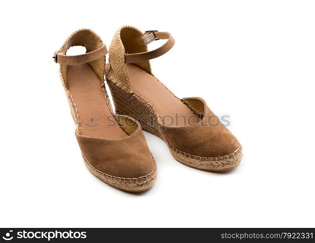 Pair of brown suede women&rsquo;s shoes. View from above. Isolate on white.