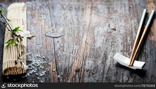 pair of chopsticks on rustic wooden background