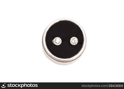 Pair of diamond crystal earrings in silver box isolated on white