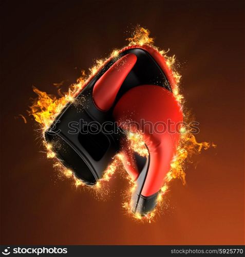 Pair of leather boxing gloves in fire