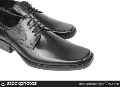 Pair of man&acute;s black shoes isolated on white background