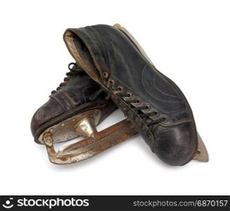 Pair of old ice skates. Isolated objects: pair of very old ice skates, on white background