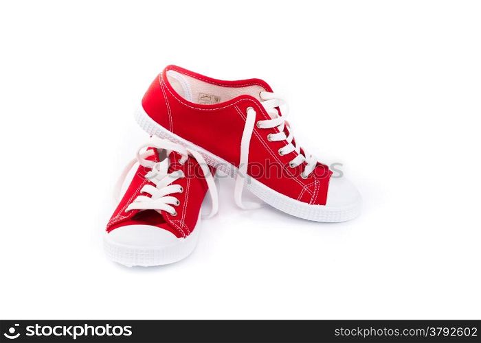 Pair of red shoes on white background