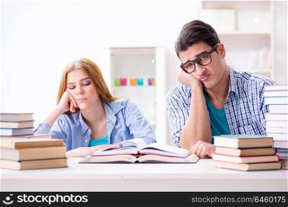 Pair of students studying for university exams