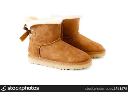 pair of uggs with fur, isolated on white