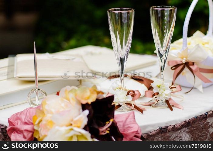 Pair of wedding wineglasses on the table