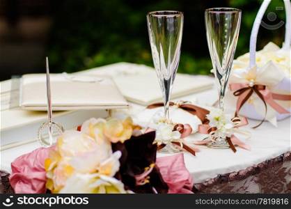 Pair of wedding wineglasses on the table