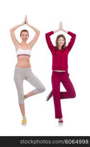 Pair of women doing exercises on white