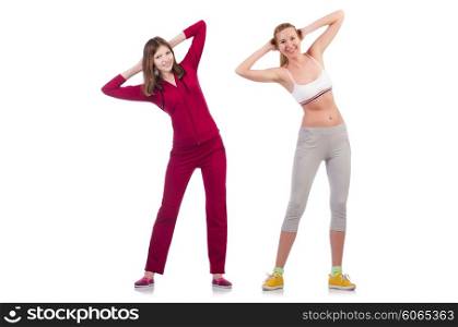 Pair of women doing exercises on white