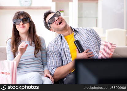 Pair watching 3d movie at home