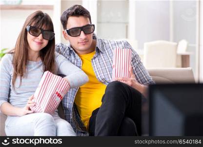 Pair watching 3d movie at home