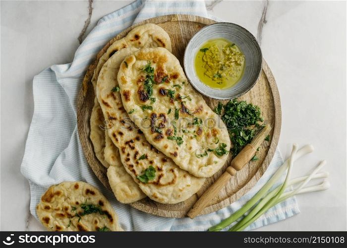 pakistani food wooden board flat lay