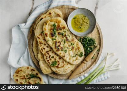 pakistani food wooden board flat lay