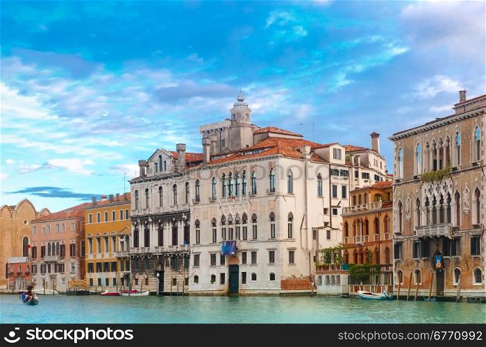 Palace in Venetian Gothic style on the Grand Canal in summer day, Venice, Italy.