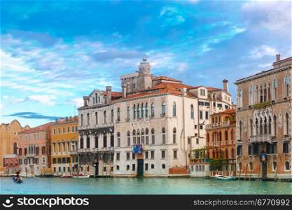 Palace in Venetian Gothic style on the Grand Canal in summer day, Venice, Italy.