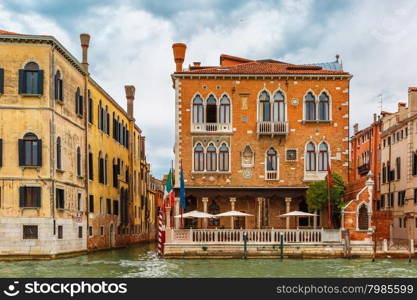 Palace in Venetian Gothic style on the Grand Canal in summer day, Venice, Italy.