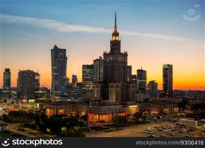 Palace of Culture and Science in Warsaw at sunset. Skyscrapers in Warsaw