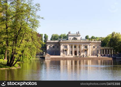 Palace on the Water, also called Lazienki Palace or Palace on the Isle in Lazienki Royal Park, Warsaw, Poland, composition with copyspace