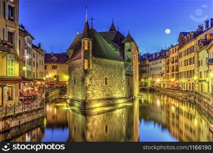 Palais de l&rsquo;Ile jail and canal in Annecy old city by night, France, HDR. Palais de l&rsquo;Ile jail and canal in Annecy old city, France, HDR